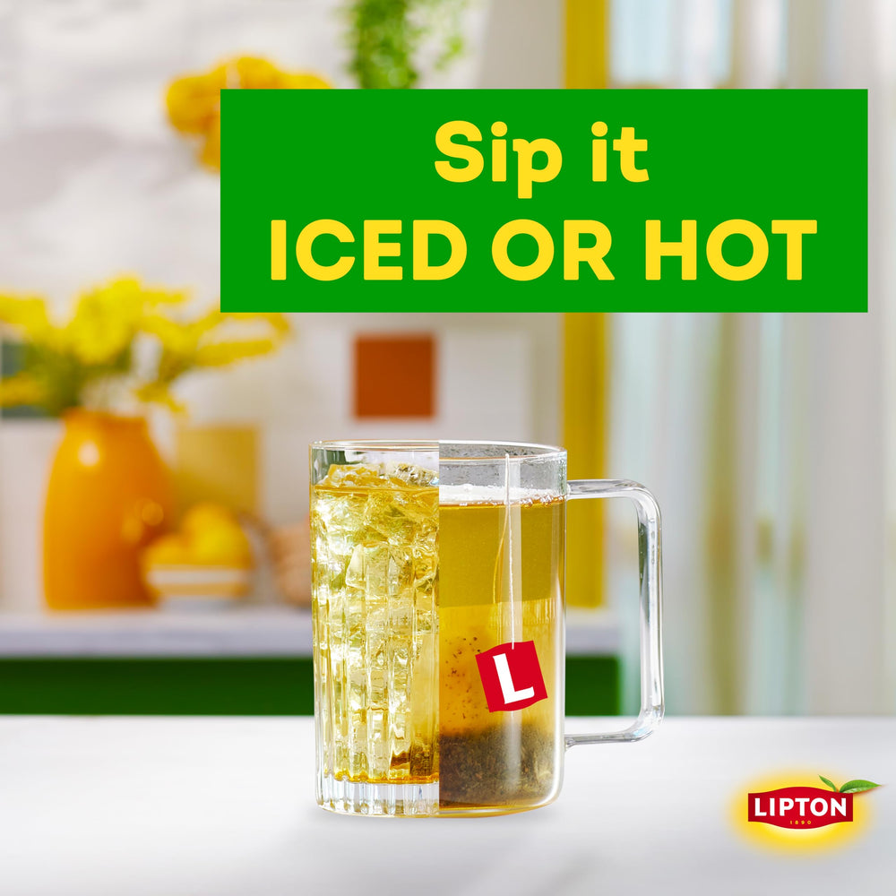 Pouring hot Lipton honey ginger green tea for a satisfying cup.