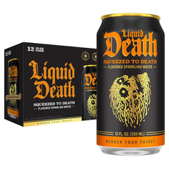 Liquid Death orange soda can closeup highlighting bold flavor and eco-friendly packaging.
