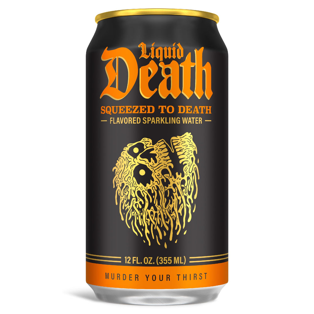 Liquid Death orange soda being poured into a glass showing crisp, refreshing aroma.