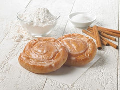 Little Debbie Honey Buns on a kitchen shelf look inviting and comforting.