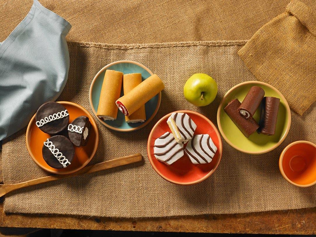 Little Debbie icing-dip shot showcases delicate sweetness and a quick dessert option.