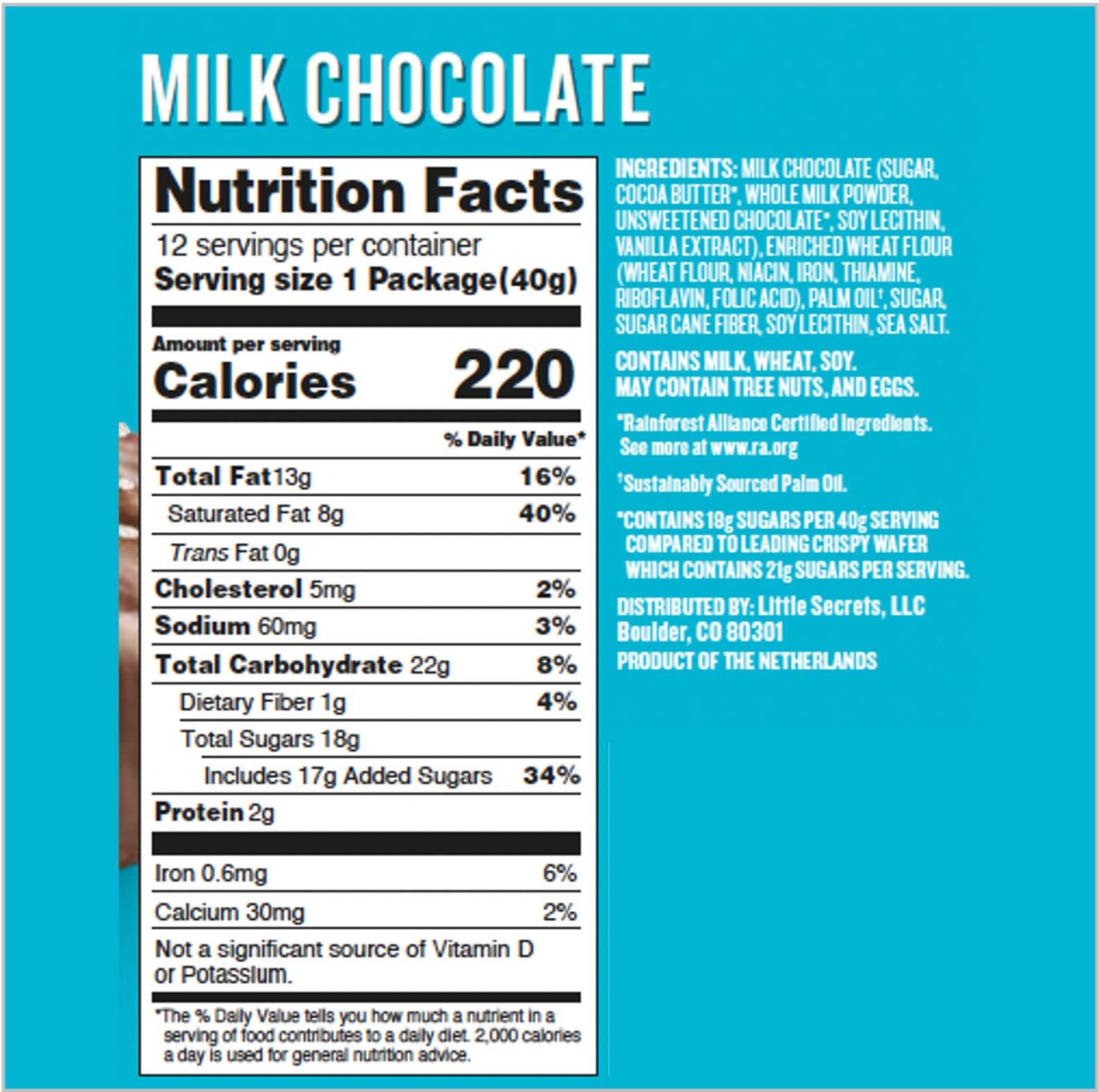 Little Secrets Milk Chocolate Crispy Wafers bar closeup highlights velvety chocolate and crisp wafers.
