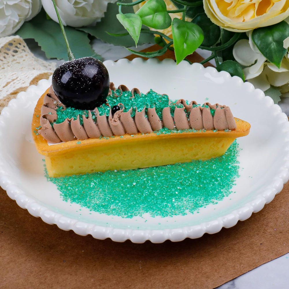 LittleStar green sanding sugar on ice cream for festive sparkle.