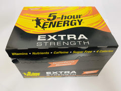 Living Essentials bottle being poured demonstrates quick energy at a desk.