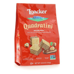 Loacker Quadratini Hazelnut Wafers packaging showcases convenient 8.82 oz size for on-the-go snacking.