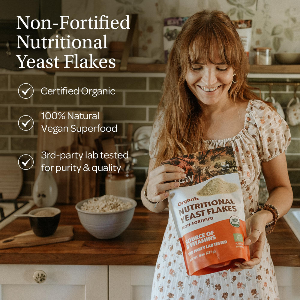 LOOV yeast flakes in a bowl illustrating versatile, dairy-free flavoring.