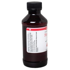 Closeup of LorAnn Strawberry SS bottle label for precise flavoring measurements.