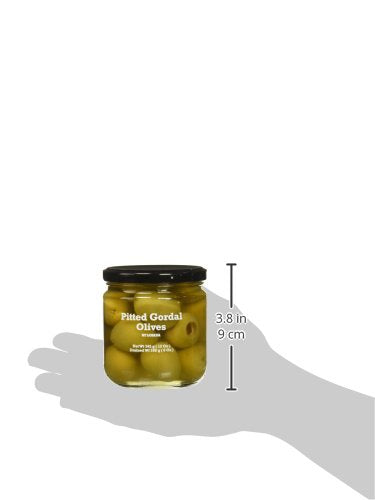 Serving board with Losada pitted Gordal olives and cheese assortment