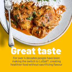 LoSalt iodized reduced-sodium pour demonstrates easy, measured seasoning at the table.