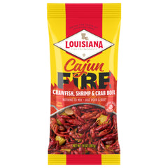 Louisiana Fish Fry Cajun Fire Boil being poured for a fiery seafood boil