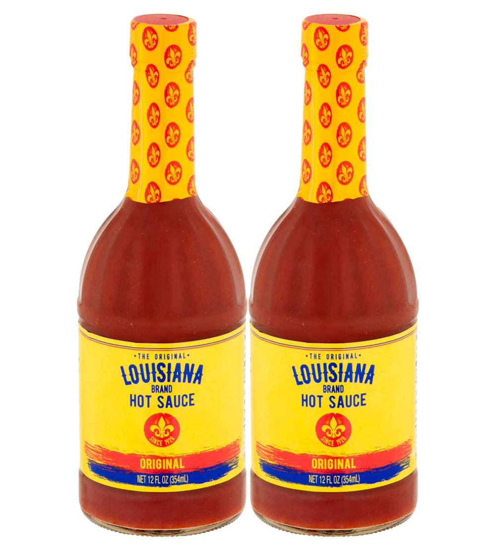 Louisiana Original Hot Sauce 12oz bottle on table for bold meal flavor.