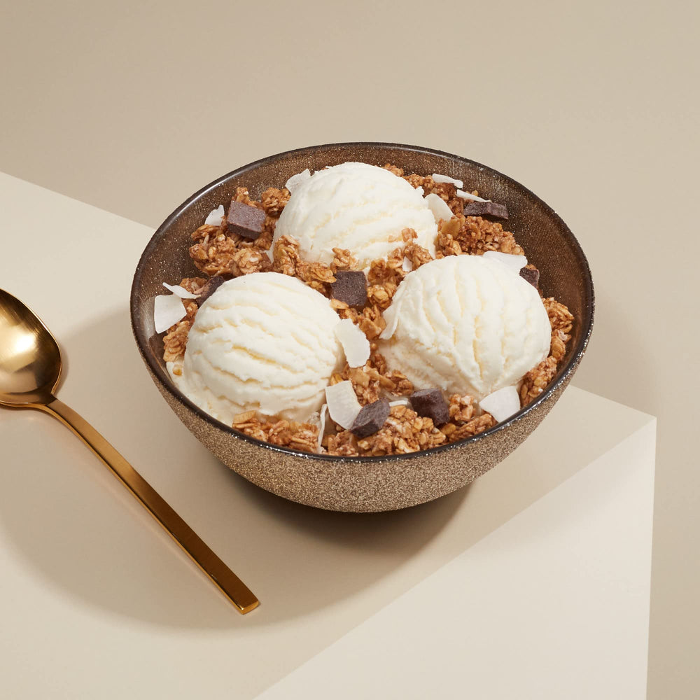 Love Crunch Coconut Flakes tropical twist on a crunchy breakfast granola.