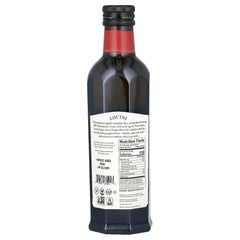 Lucini Organic Everyday Extra Virgin Olive Oil drizzled over a fresh salad.