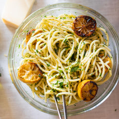 Lucini Premium Select olive oil pour demonstrates smooth texture for sautéing