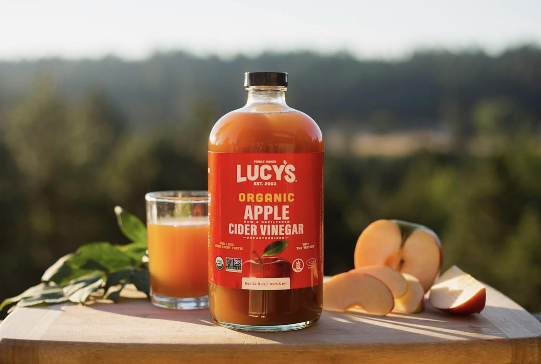 Pouring Lucy’s ACV into a glass for a refreshing mix.