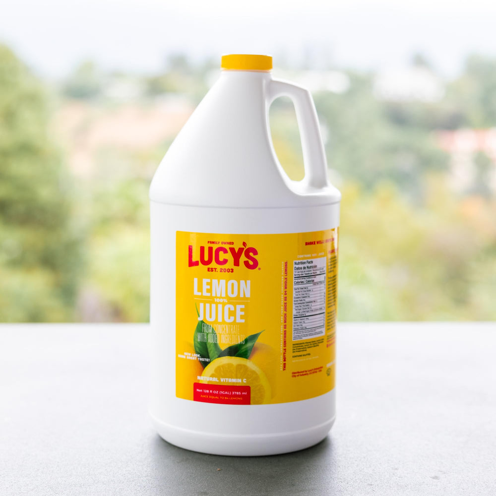 Lucys lemon juice concentrate bottle highlights bulk storage and easy cooking.