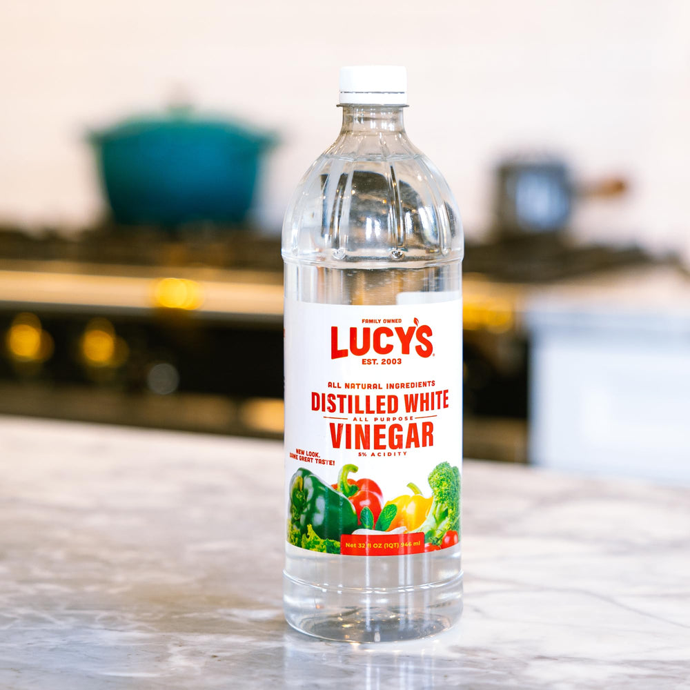 Lucy’s White Vinegar cuts grease on kitchen surfaces.