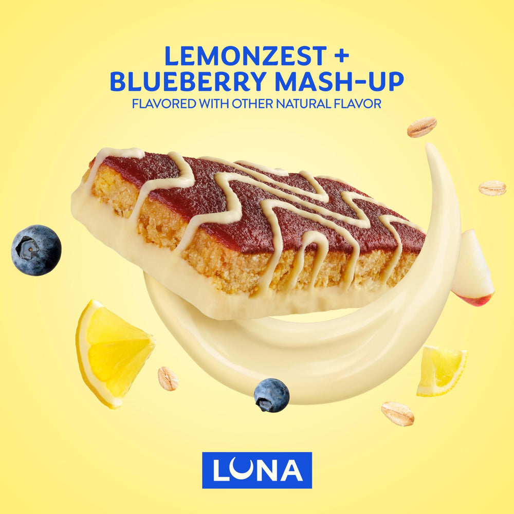Luna Bar Mash-Ups LemonZest + Blueberry bar being opened reveals chewy texture