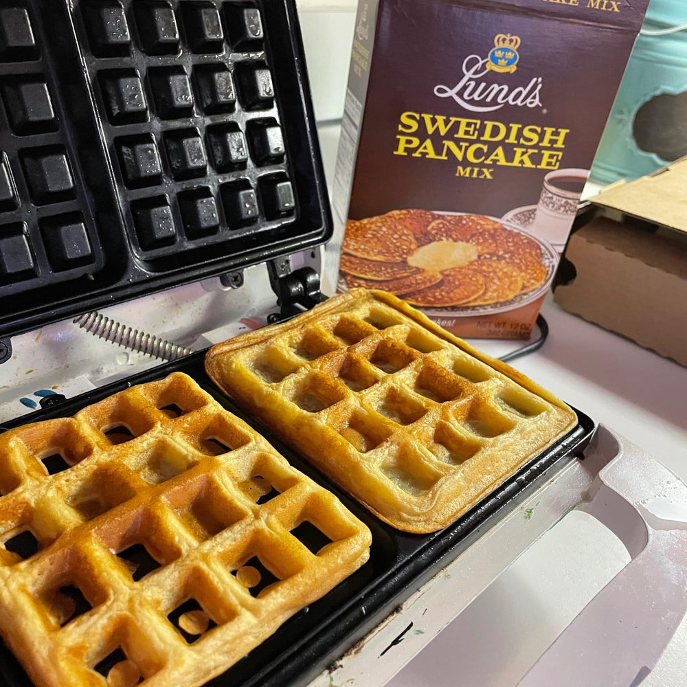 Swedish heritage vibes with a serving of pancakes and lingonberry jam.