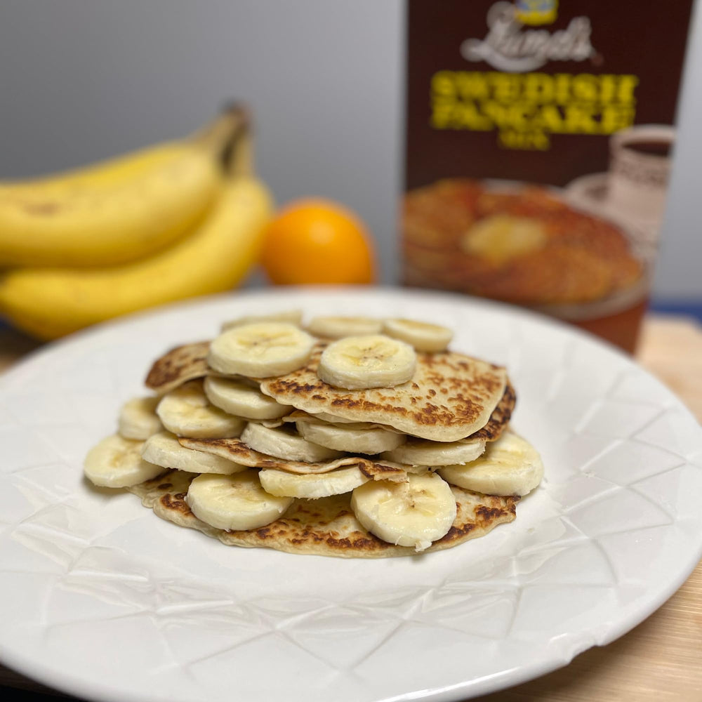 Lunds pancakes with lingonberry topping for a Nordic flavor.