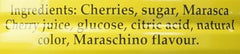 Open Luxardo can shows candied cherries and syrup ready for service.
