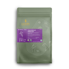 Luxmi Estates Valerian Dream tea packaging highlights organic blend for relaxation.