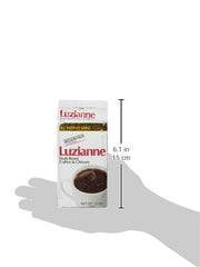 Luzianne dark roast chicory coffee cup emitting rich aroma for a comforting brew.