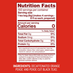 Close-up of Luzianne decaffeinated tea bags packaging showing blend quality and sustainability seal.