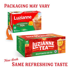 Luzianne iced tea brew pouring into a glass, showing rich amber color.