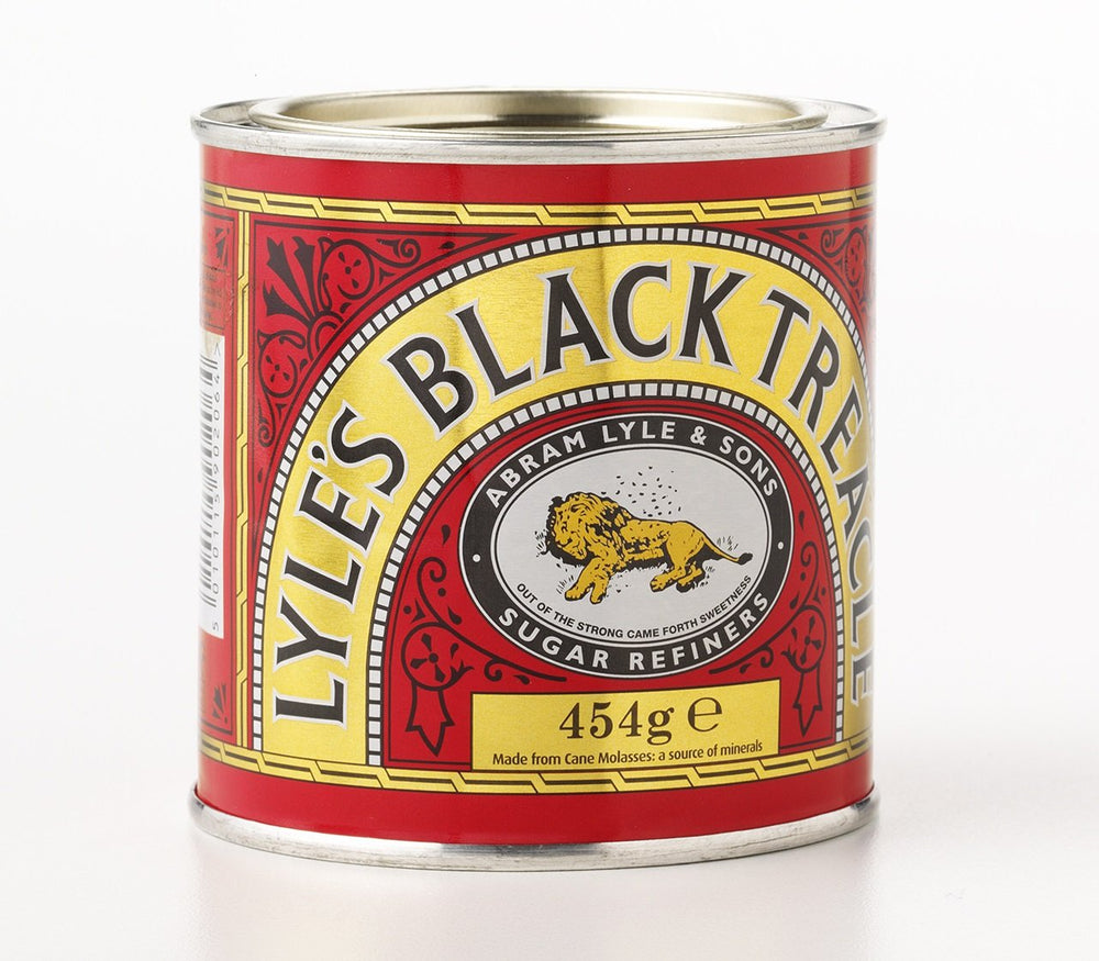 Lyle's Golden Syrup treacle poured over dessert glaze for glossy finish.