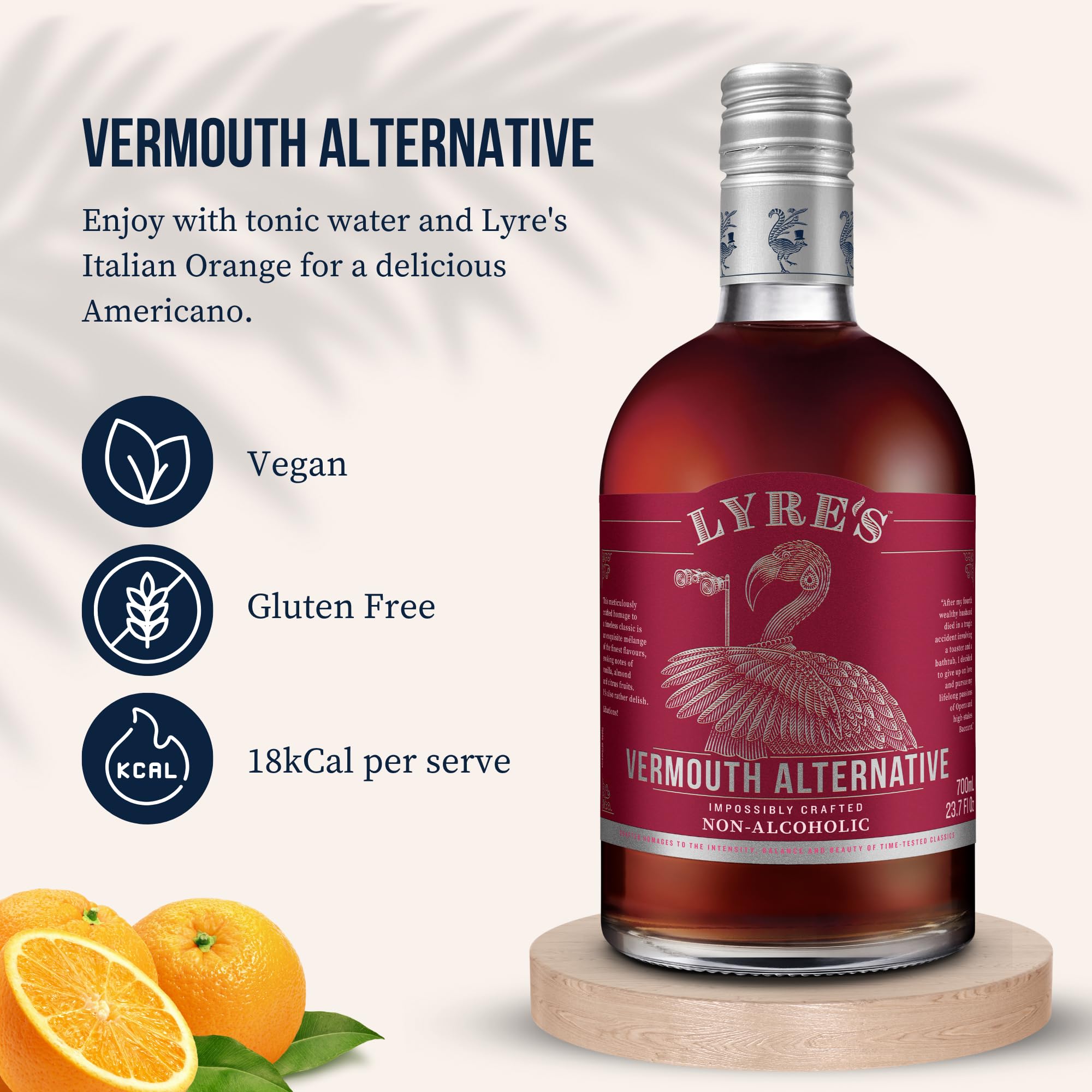 Lyre's Vermouth Rosso glass with cocktail setup demonstrates zero-proof elegance.