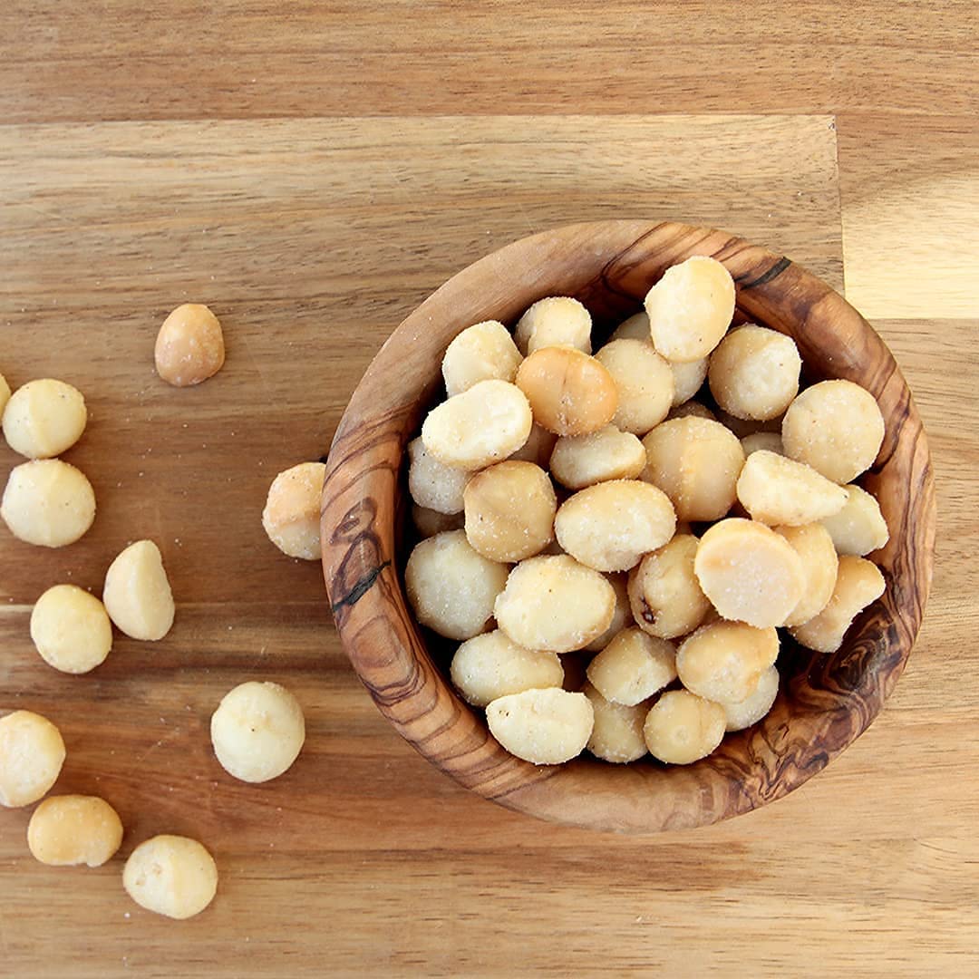 Gift-ready MacFarms macadamias in a reusable container for Hawaii-inspired snacking.