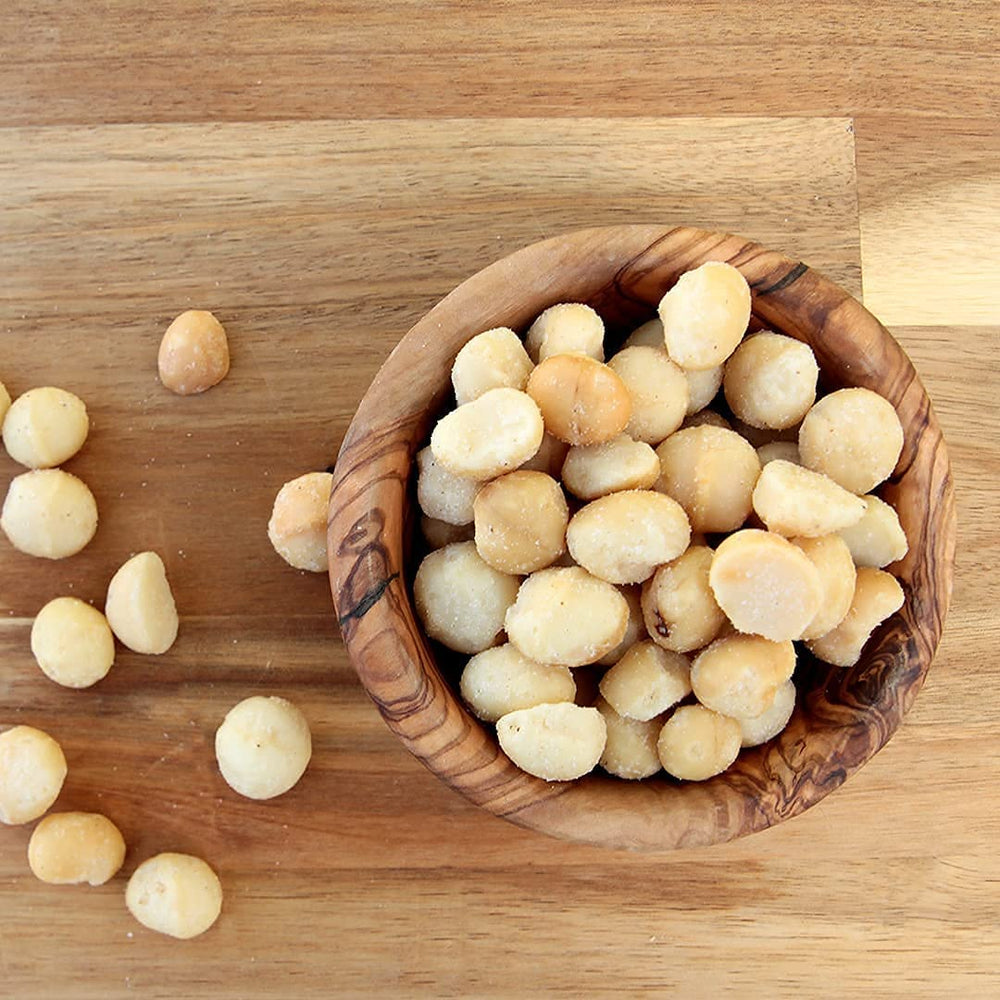 Gift-ready MacFarms macadamias in a reusable container for Hawaii-inspired snacking.