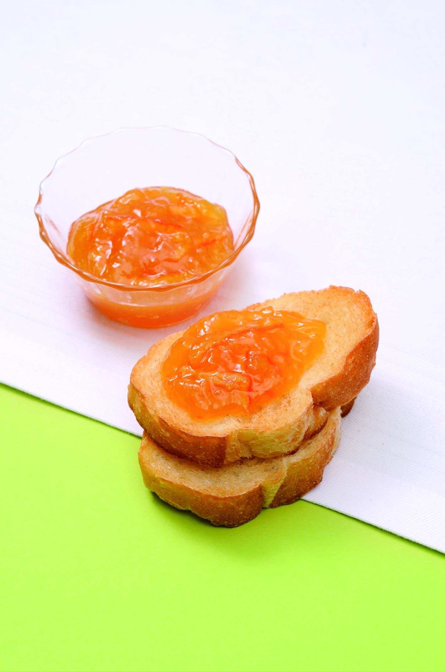 Mackays Dundee Orange Marmalade close-up reveals glossy amber texture