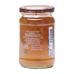 Mackays Ginger Preserve with spoon, ideal for glazing desserts or pastries