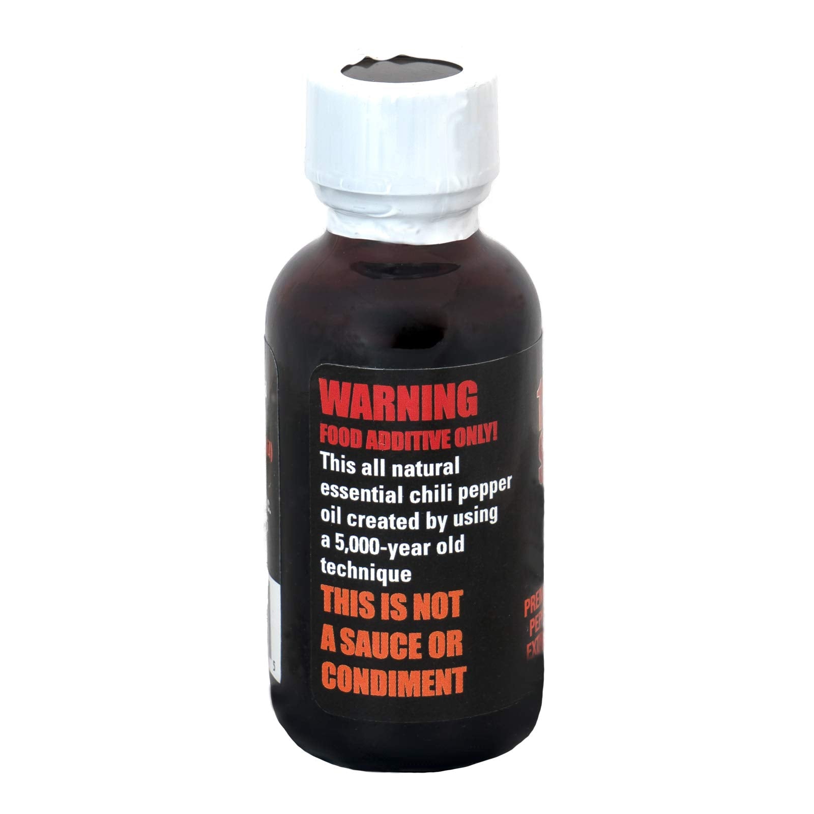 Mad Dog Gear ECO 1 Million Scoville amber oil closeup highlighting rich aroma and purity.