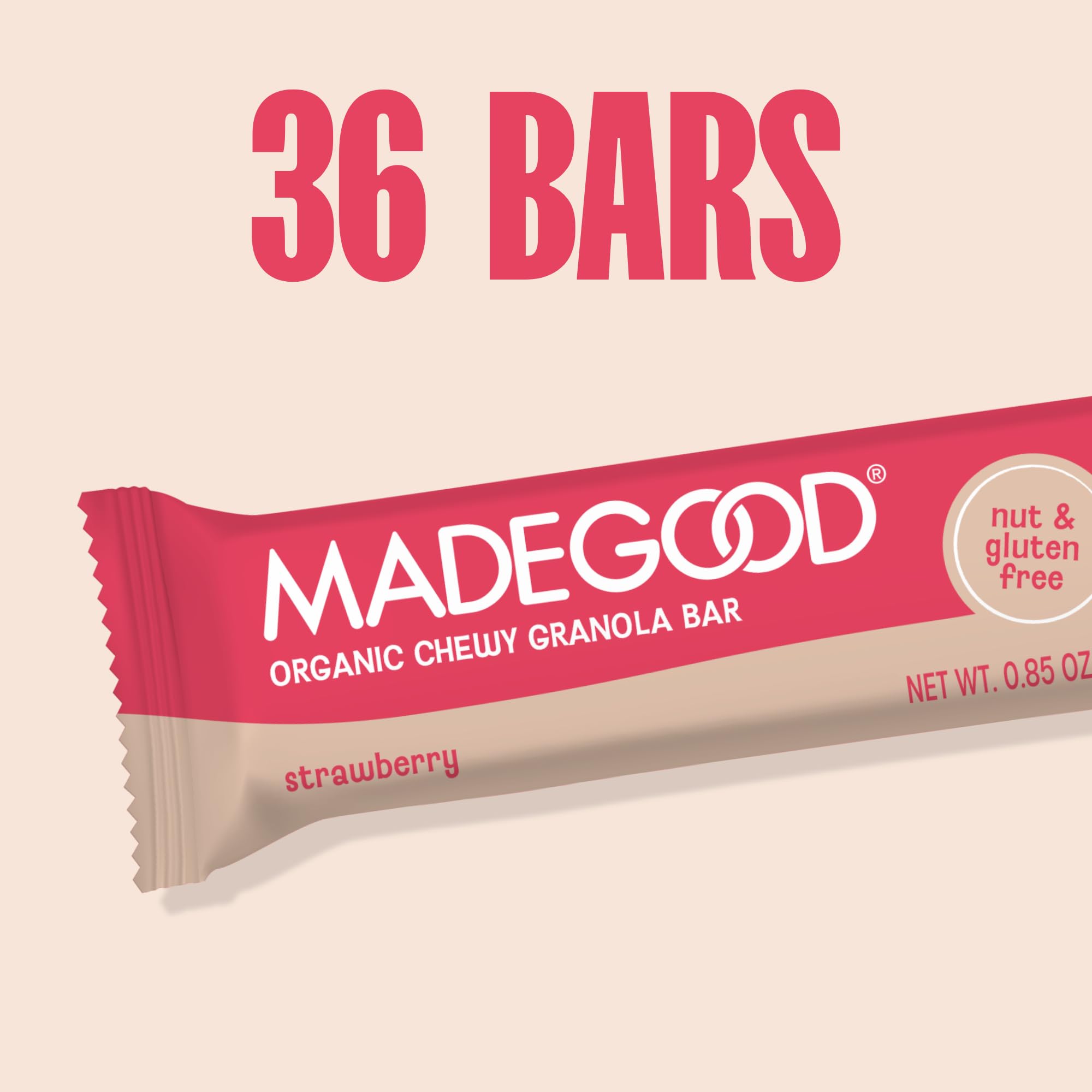 Individual MadeGood bar on kitchen counter with strawberry garnish.