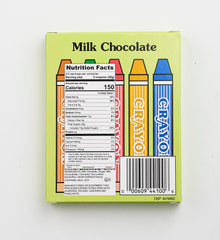 Madelaine Chocolate Crayons box opened, colorful milk chocolate crayons for party favors.
