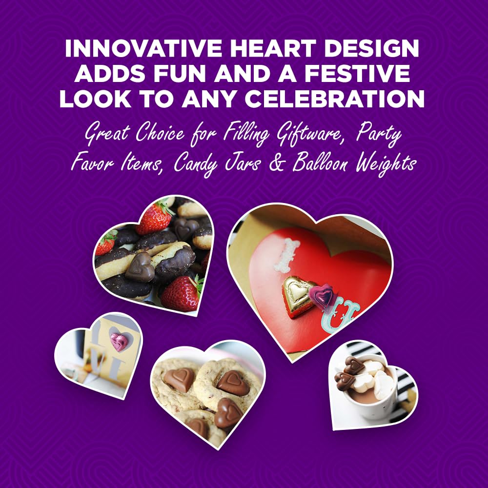 A Madelaine Milk Chocolate Mini Heart held in hand.
