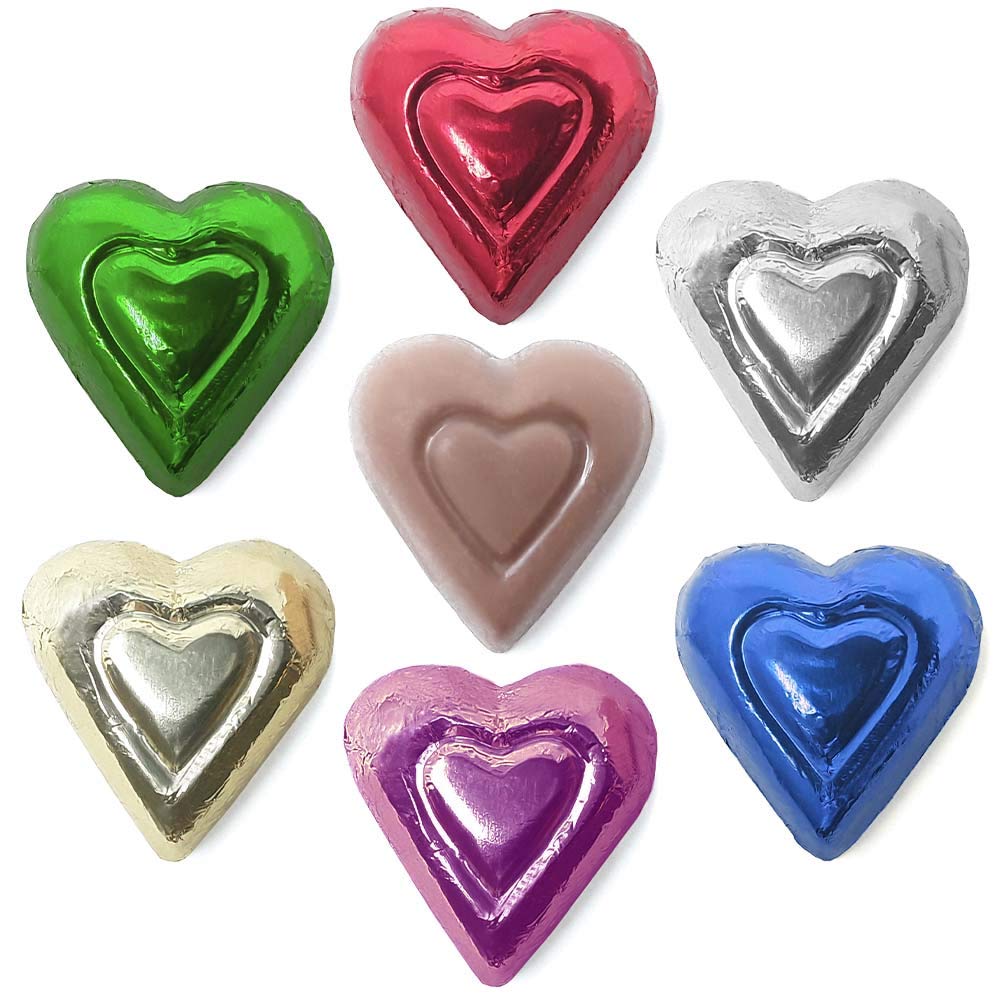 Wedding favors feature Madelaine Milk Chocolate Mini Hearts in rainbow foil.