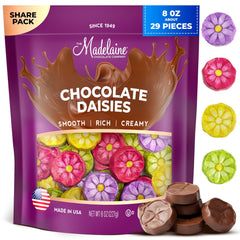 Madelaine solid milk chocolate with gerbera daisies wrapped in Italian foil, ideal for gifting.