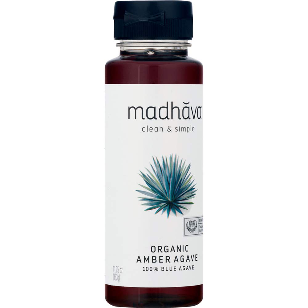 Madhava bottle with coffee cup demonstrates natural sweetener for beverages.