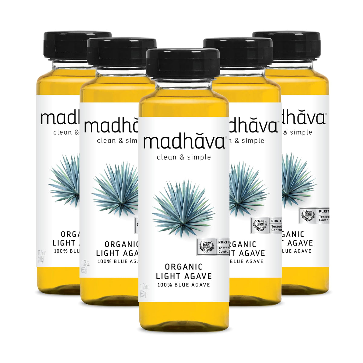 Madhava Organic Light Agave Nectar bottle on counter, ideal natural sweetener for beverages.