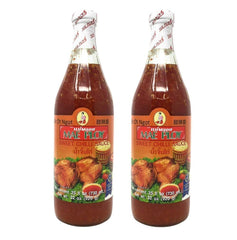 Mae Ploy Sweet Chilli Sauce bottle pour showing versatile dipping and glazing.