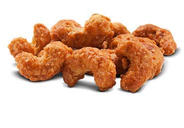 Magic Bavarian Cinnamon Roasted Cashews on a plate, inviting warm aroma.