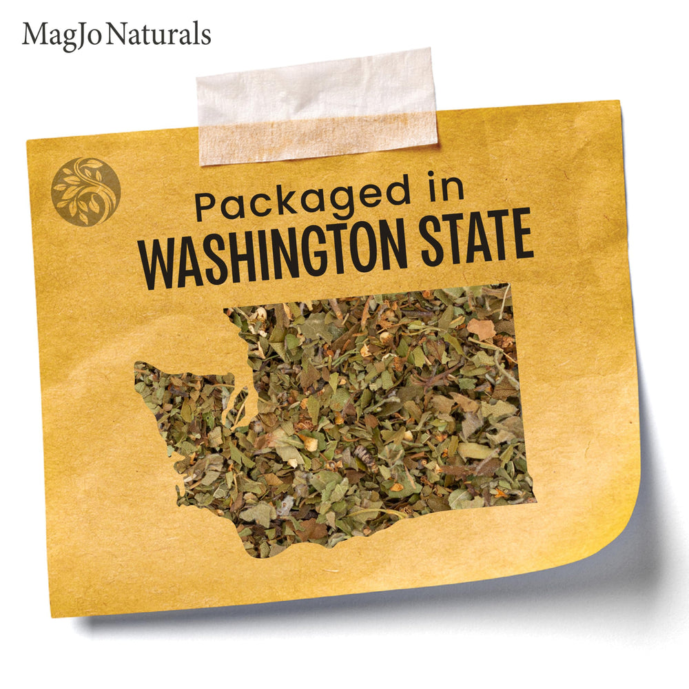 MagJo Naturals hawthorn tea steeping in a cup showing bright color.