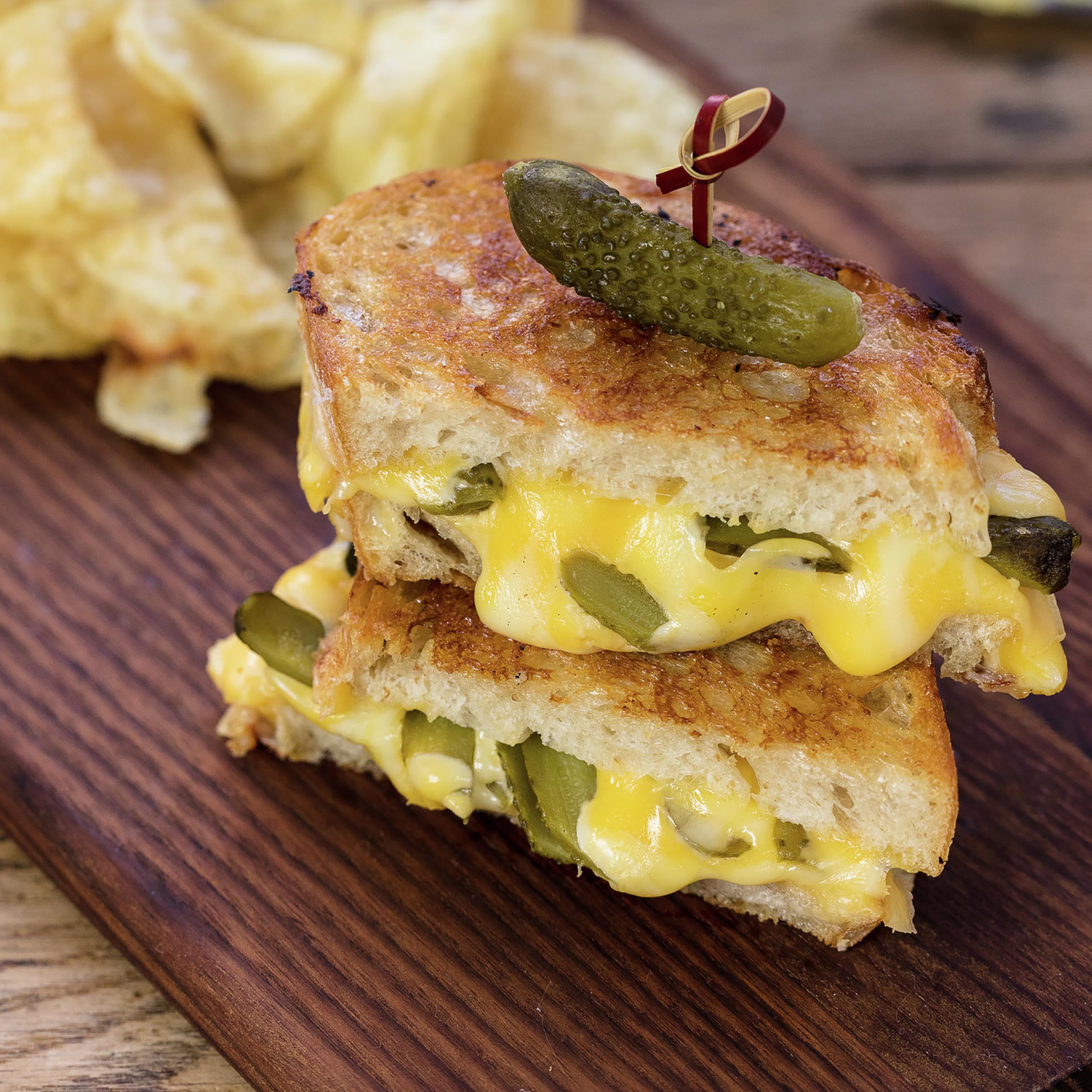 Maille Cornichons Original on a charcuterie board adds brightness