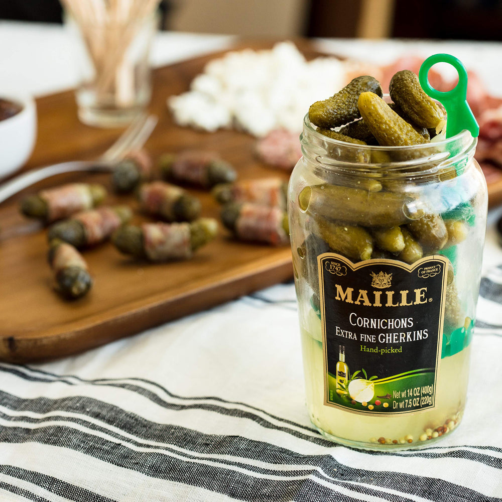 Maille Cornichons Original on a cheese board enhances pairing