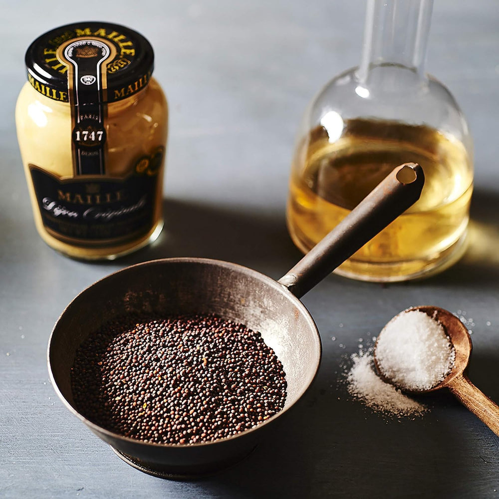 Maille Dijon Originale used in marinades to deepen flavors.