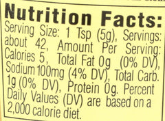 Close-up of Maille Old Style mustard seeds showing grainy texture